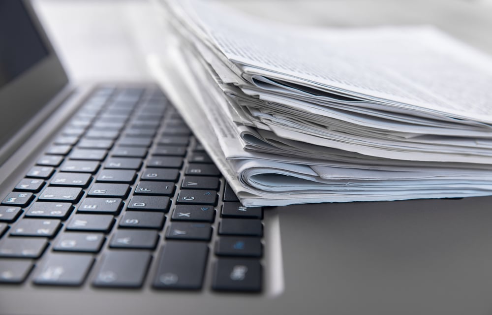 Papers_Pile_Laptop.jpg